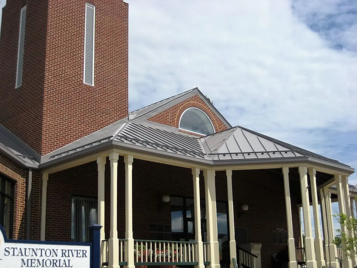 Skilled roofing craftsmen working on a residential roof in Waverly Hills
